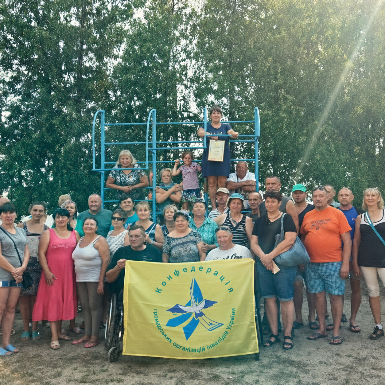 Park group photo with Confederation flag